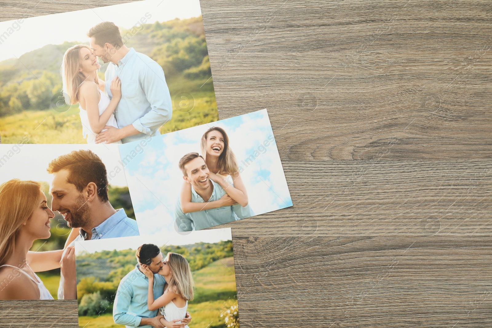 Photo of Different family photos on wooden table, flat lay. Space for text