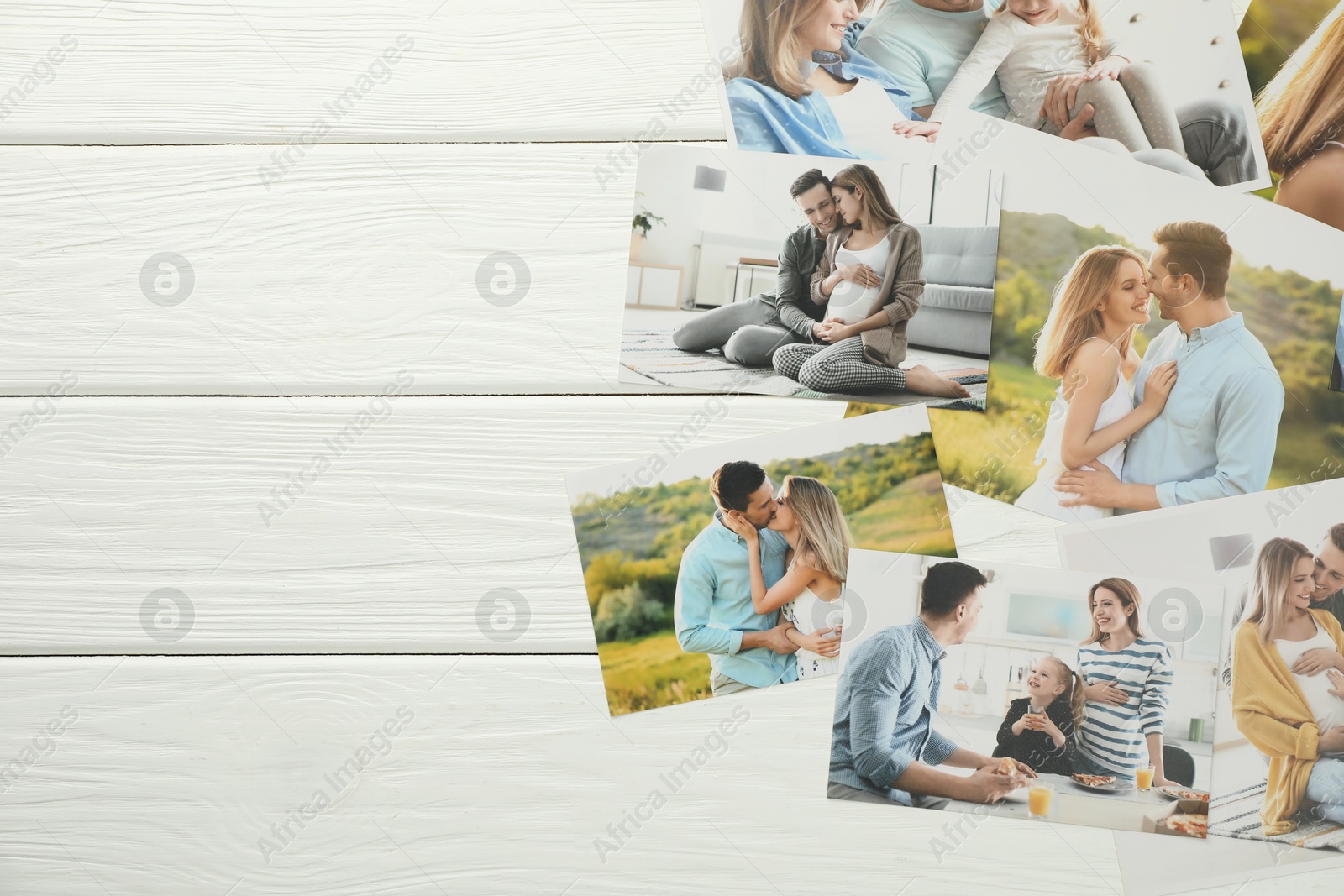 Photo of Different family photos on white wooden table, flat lay. Space for text