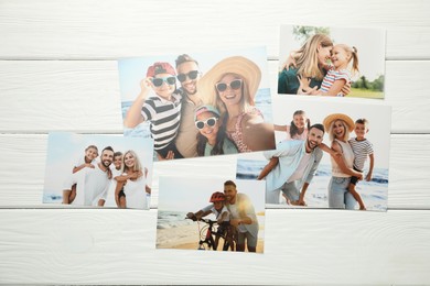 Photo of Different family photos on white wooden table, flat lay