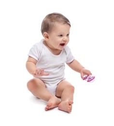 Photo of Cute little baby with toy on white background