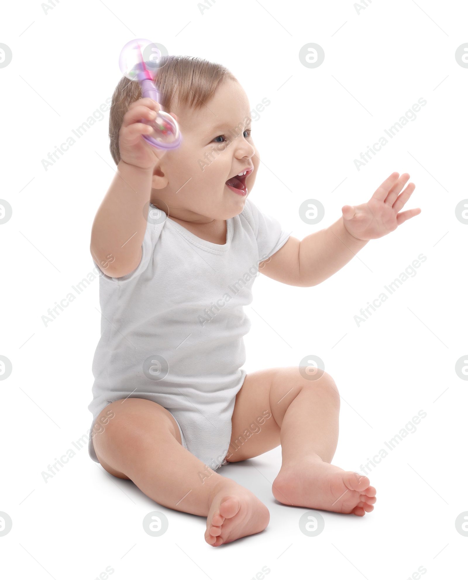 Photo of Cute little baby with toy on white background