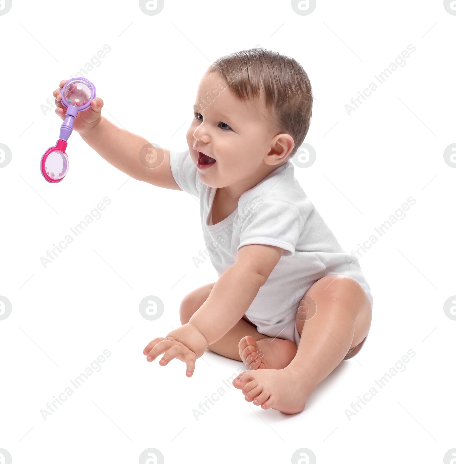 Photo of Cute little baby with toy on white background