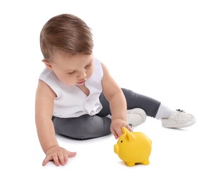 Photo of Little baby with piggybank on white background