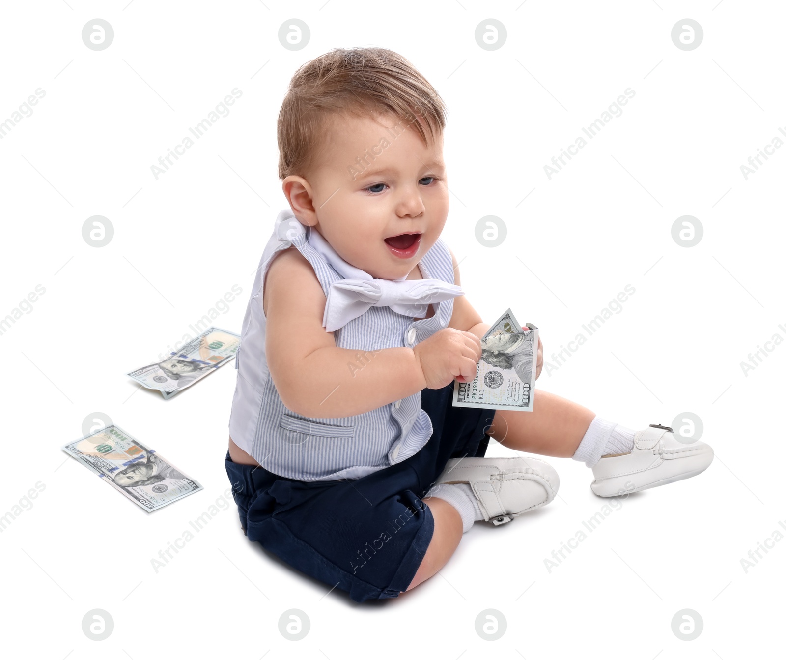 Photo of Little baby with money on white background