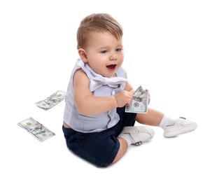 Photo of Little baby with money on white background