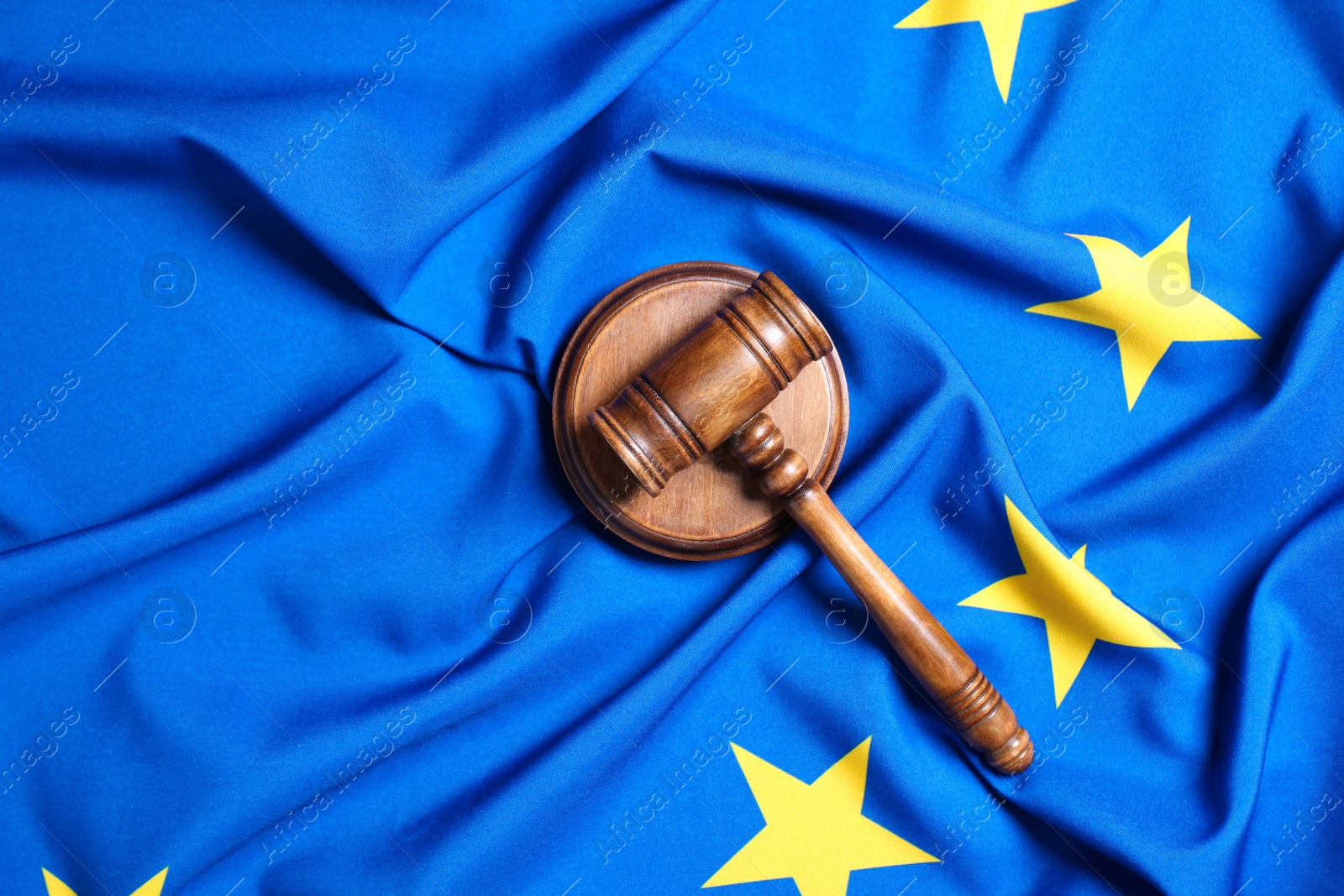 Photo of Judge's gavel on flag of European Union, top view