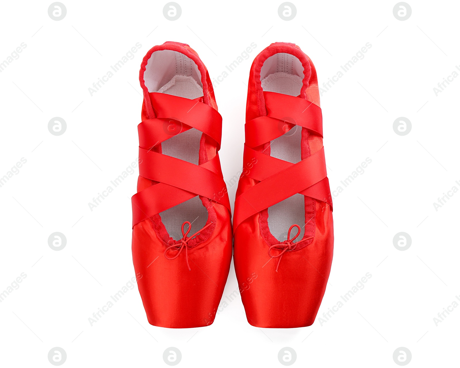 Photo of Pair of beautiful red pointe shoes isolated on white, top view