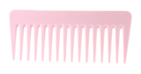 Photo of One pink plastic comb isolated on white