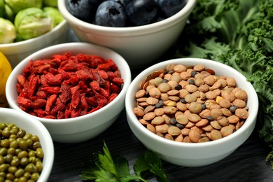 Photo of Superfood. Different healthy food products on table, closeup