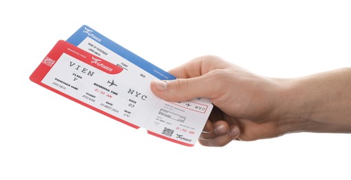 Photo of Travel agency. Man holding flight tickets on white background, closeup