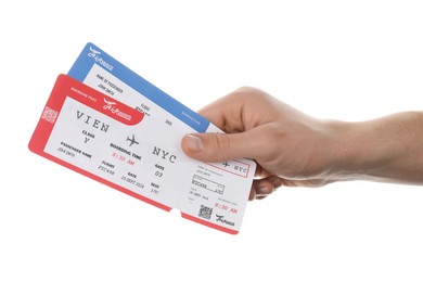 Photo of Travel agency. Man holding flight tickets on white background, closeup