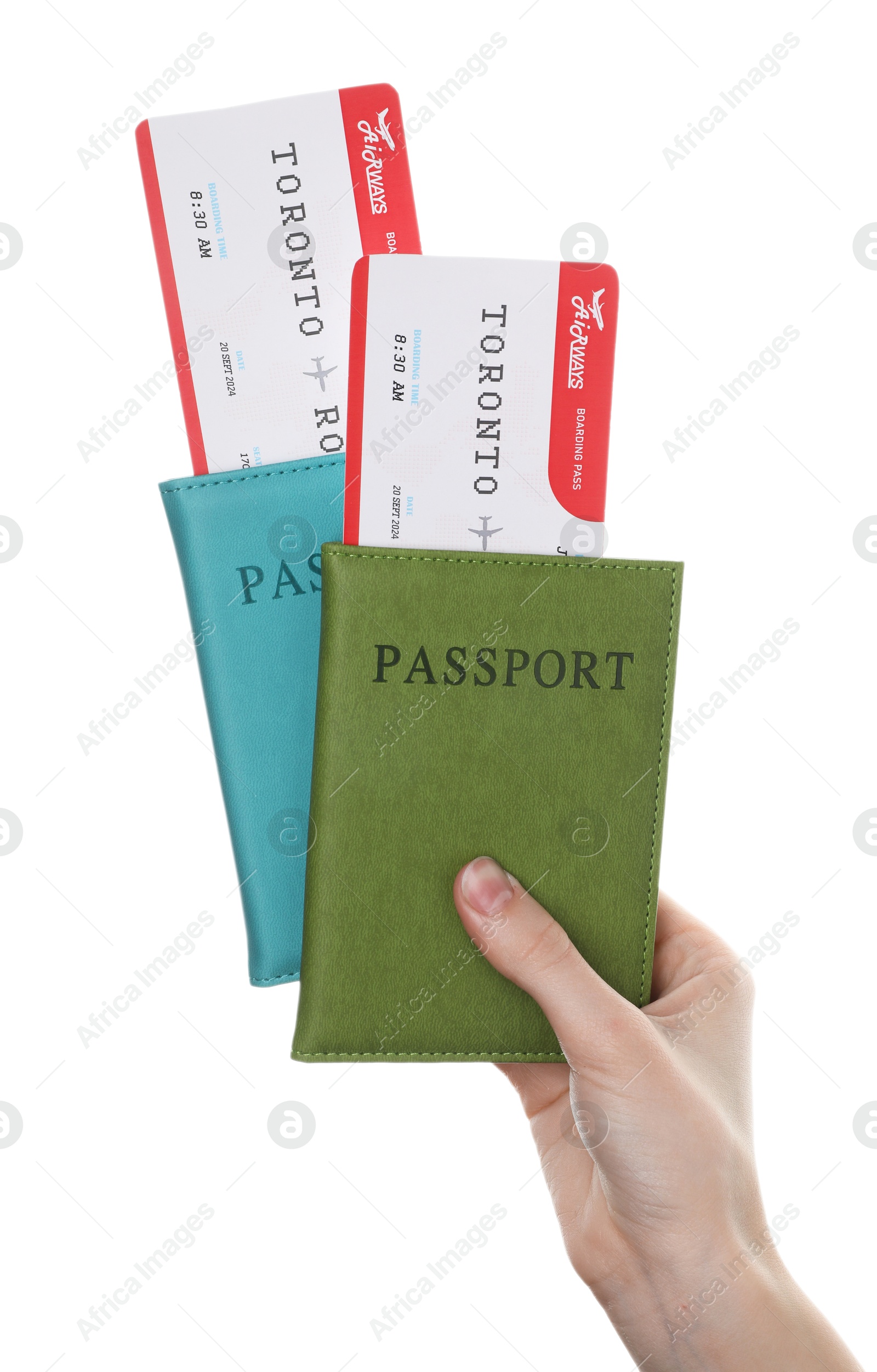 Photo of Travel agency. Woman holding flight tickets and passports on white background, closeup