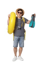 Photo of Traveller with inflatable ring and swim fins on white background