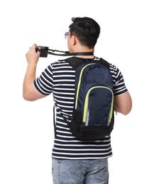 Photo of Traveller with backpack taking photo on white background, back view