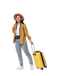 Photo of Happy traveller with suitcase on white background