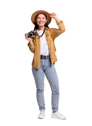 Photo of Happy traveller with camera on white background