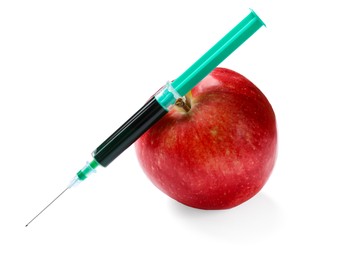 Photo of GMO concept. Red apple and syringe isolated on white