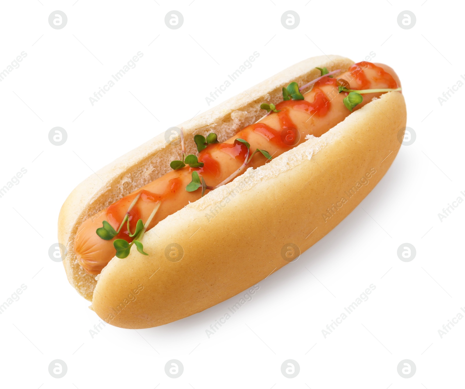 Photo of Tasty hot dog with ketchup and microgreens isolated on white