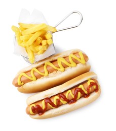 Photo of Tasty hot dogs with fries isolated on white, top view