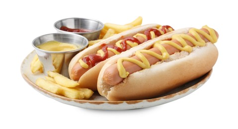 Photo of Tasty hot dogs with fries and sauces isolated on white