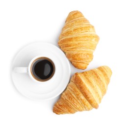 Photo of Tasty fresh croissants and cup of coffee isolated on white, top view. Puff pastry