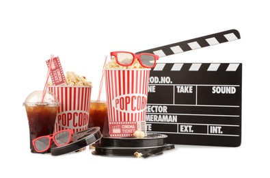 Photo of Tasty popcorn, glasses, film reels, soda drinks, clapper and movie ticket isolated on white