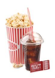 Photo of Tasty popcorn, drink and movie ticket isolated on white