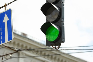 Photo of View of traffic light in city on sunny day