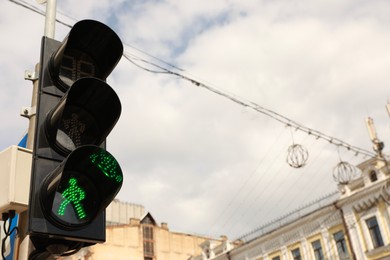 Photo of View of traffic light in city on sunny day. Space for text