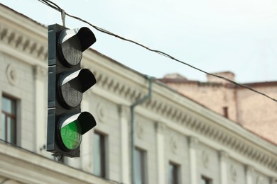 Photo of View of traffic light in city on sunny day. Space for text