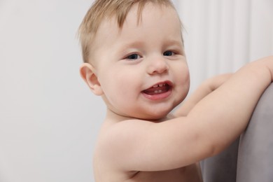 Photo of Portrait of cute little baby at home