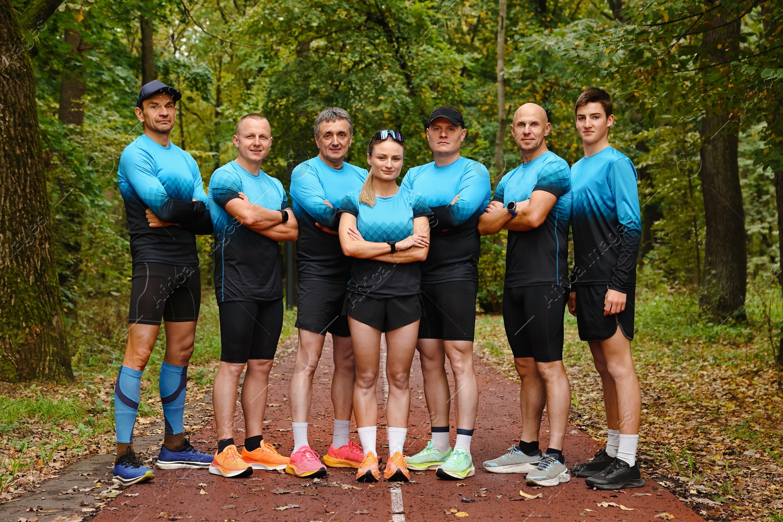 Photo of Group of athletic people together in park