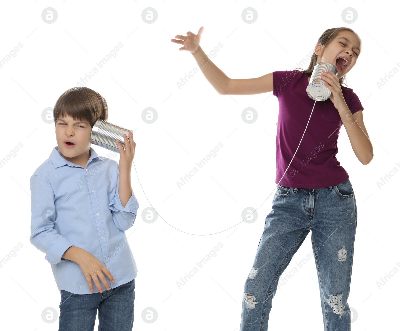 Photo of Girl and boy talking on tin can telephone against white background