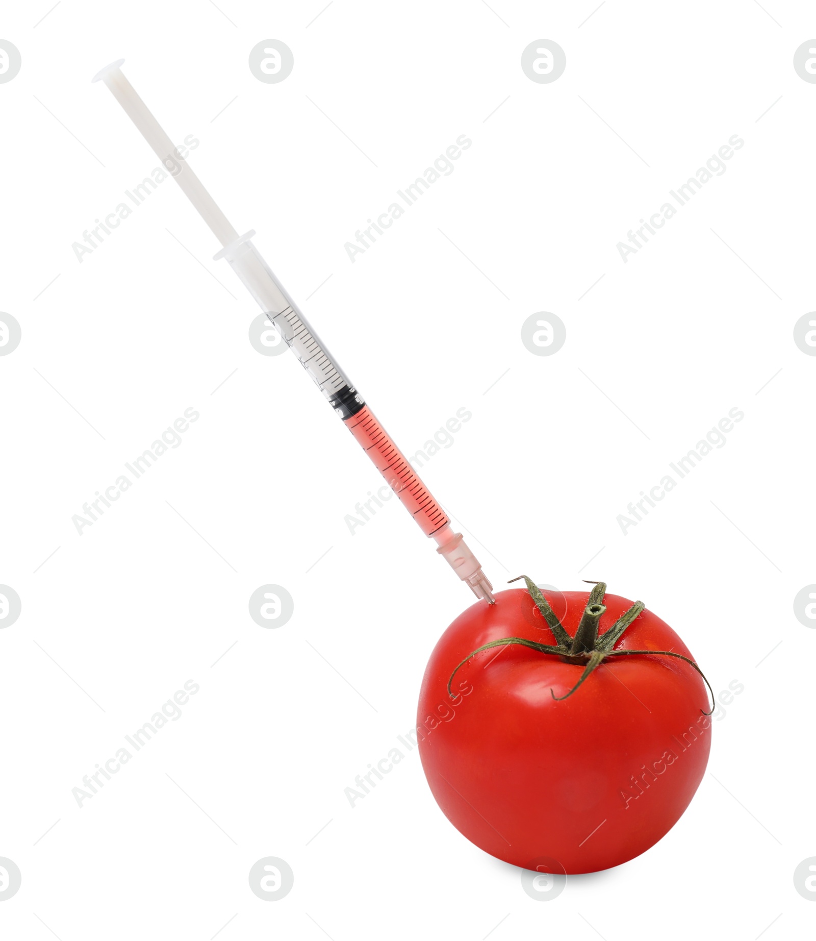 Photo of GMO concept. Fresh tomato and syringe isolated on white