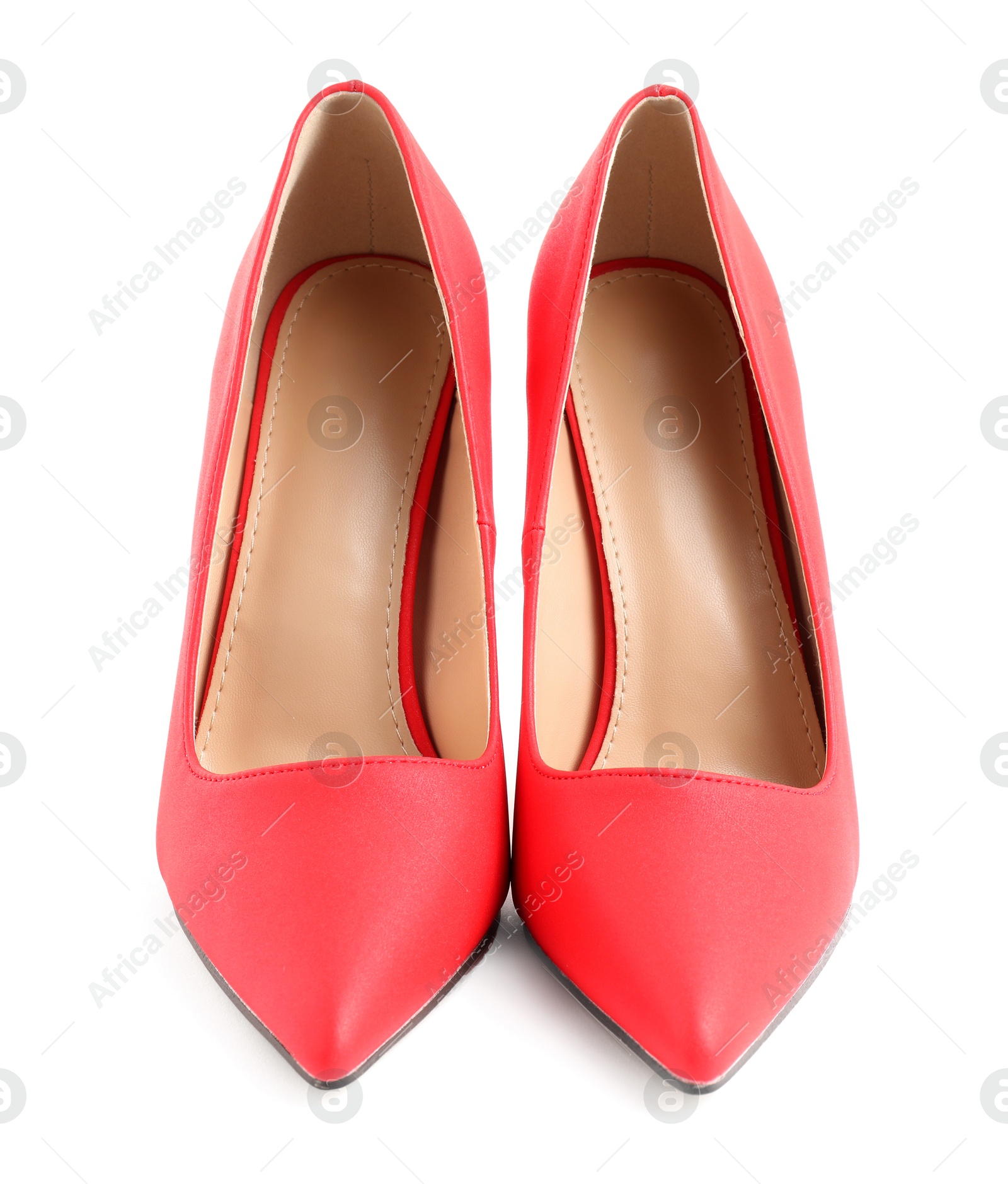 Photo of Pair of red high-heeled shoes isolated on white