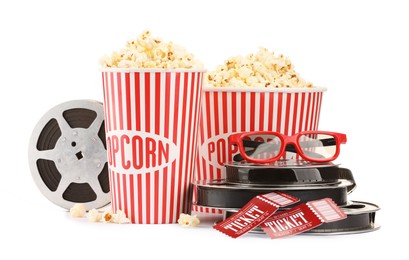 Photo of Tasty popcorn, film reels, glasses and movie tickets isolated on white