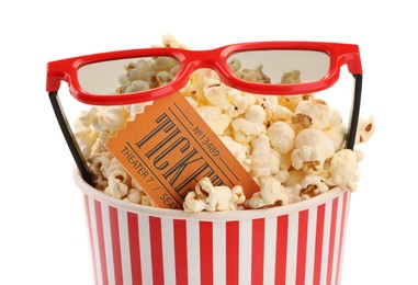 Photo of Tasty popcorn, glasses and movie ticket isolated on white