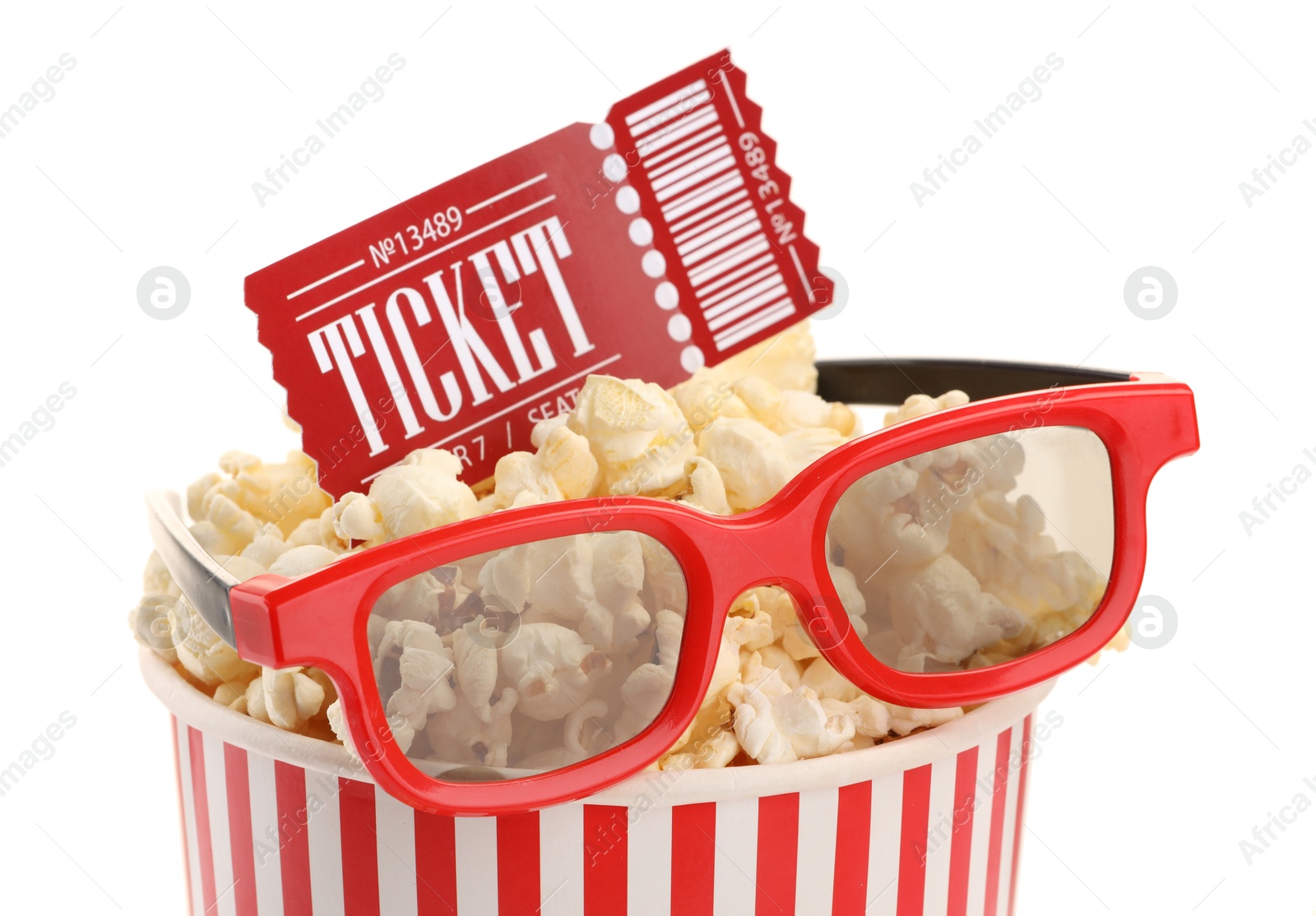 Photo of Tasty popcorn, glasses and movie ticket isolated on white