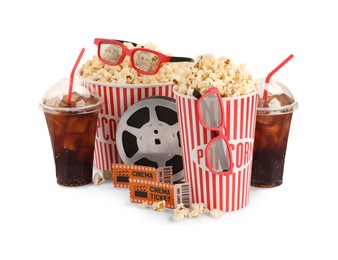 Photo of Tasty popcorn, film reel, glasses, clapper, soda drinks and movie tickets isolated on white