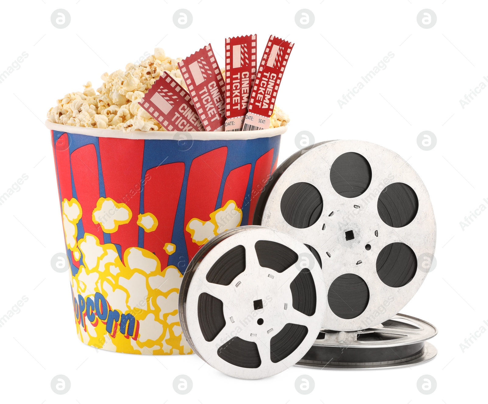 Photo of Tasty popcorn, film reels and movie tickets isolated on white