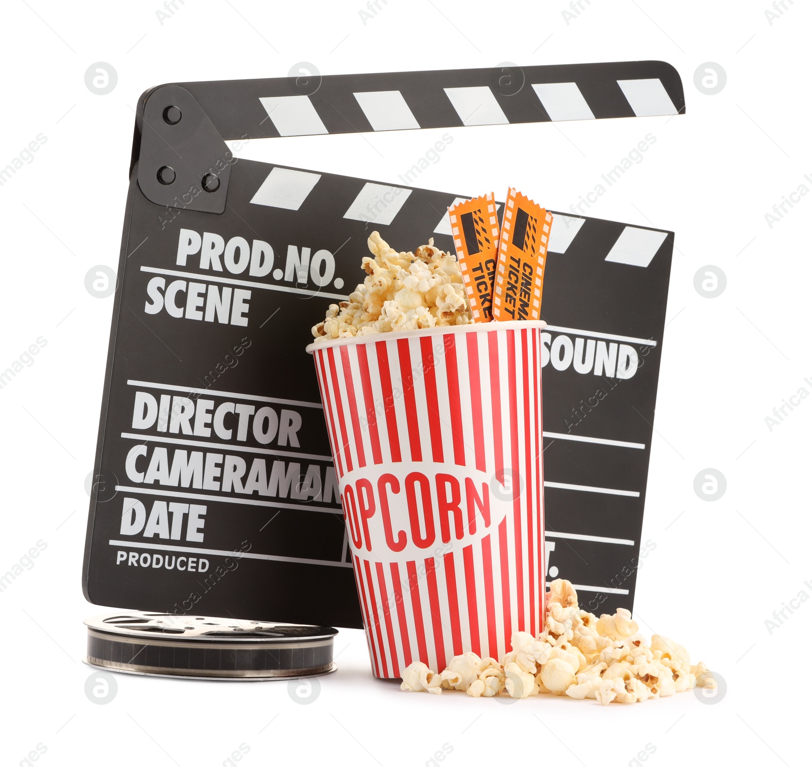 Photo of Tasty popcorn, clapper, film reel and movie tickets isolated on white