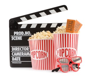 Photo of Tasty popcorn, clapper, glasses and movie tickets isolated on white