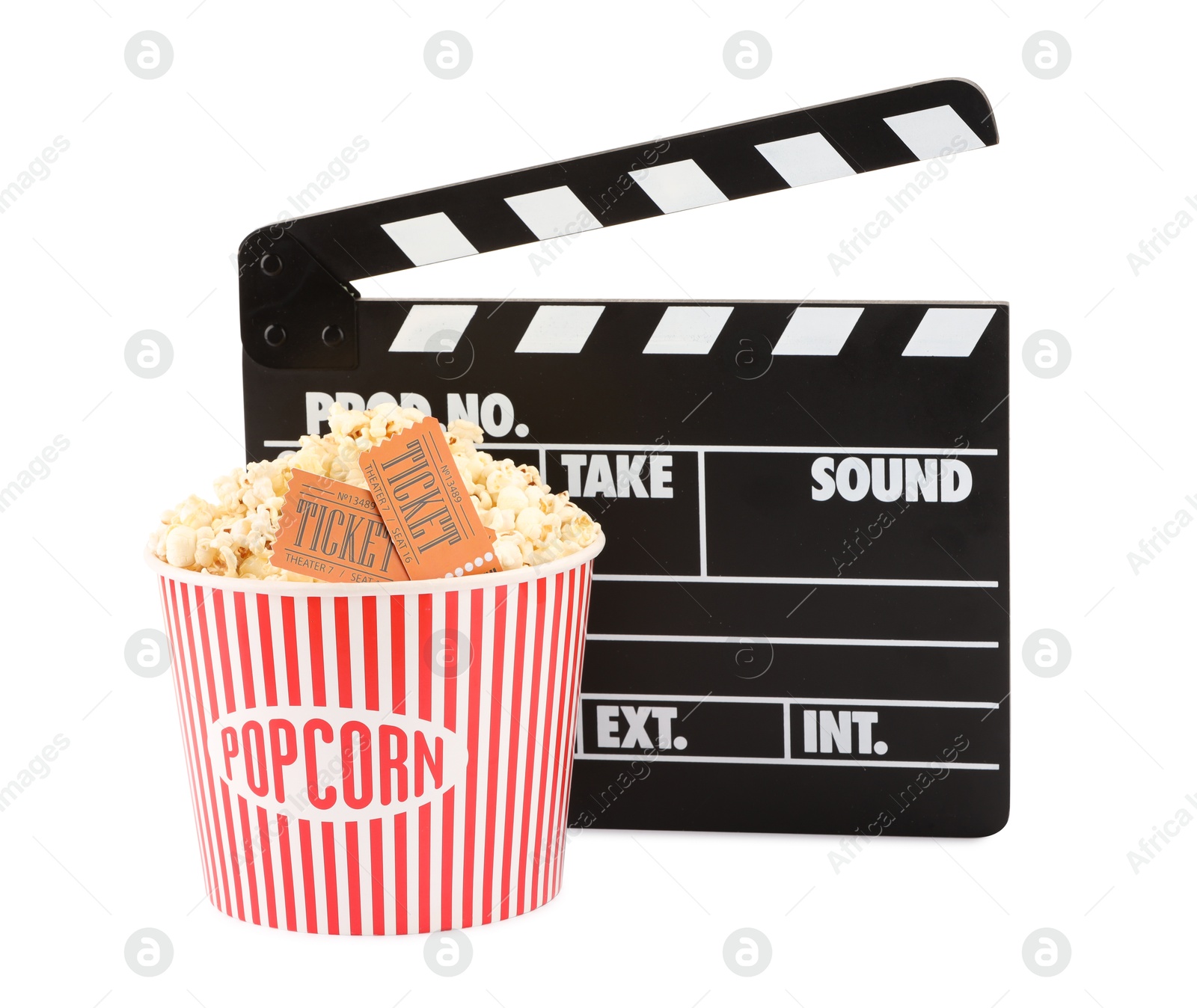 Photo of Tasty popcorn, clapper and movie tickets isolated on white