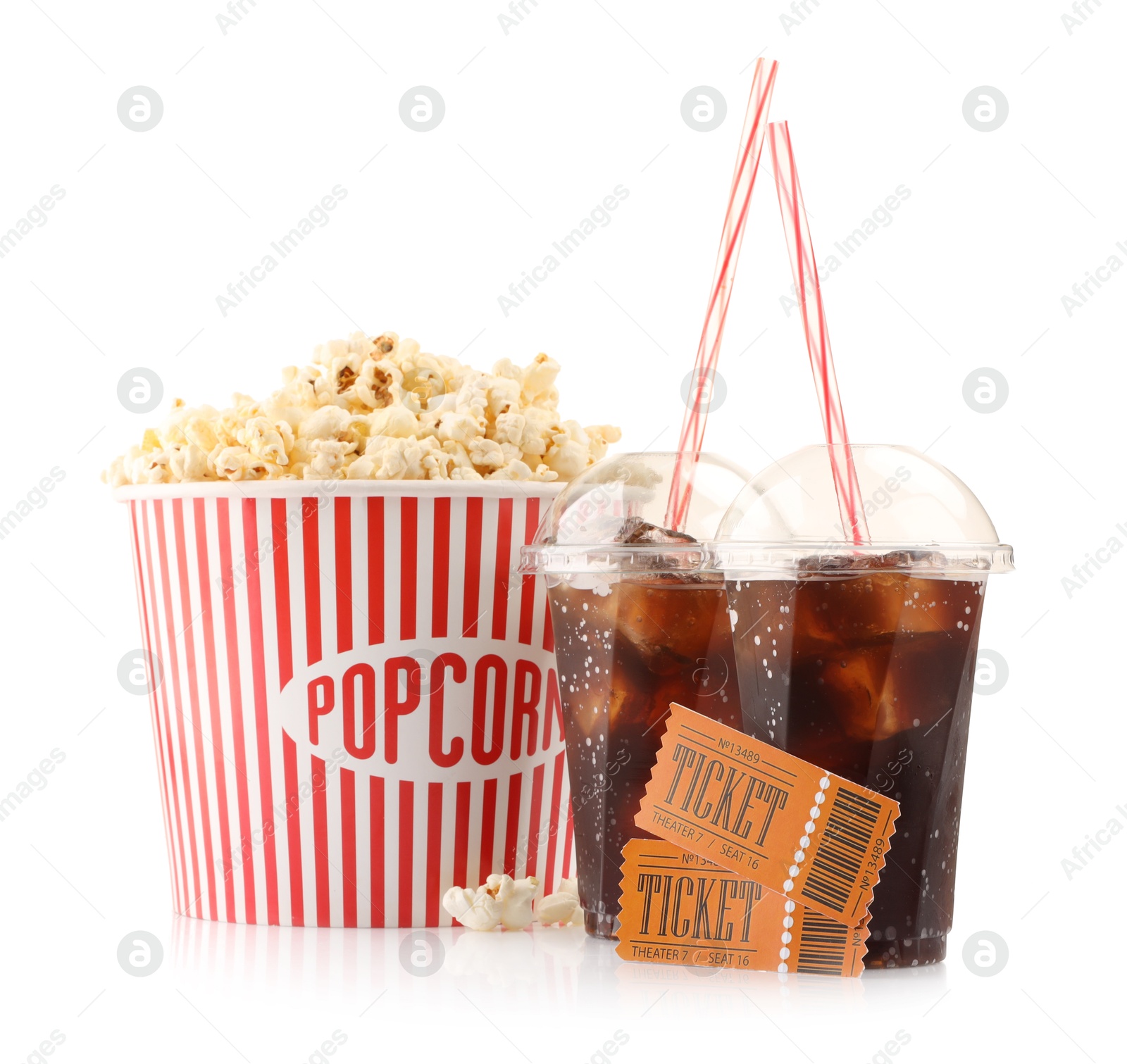 Photo of Tasty popcorn, drinks and movie tickets isolated on white