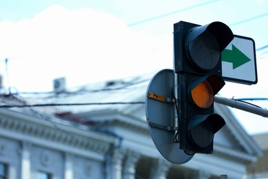 Photo of View of traffic light in city on sunny day. Space for text