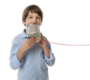 Photo of Boy using tin can telephone on white background