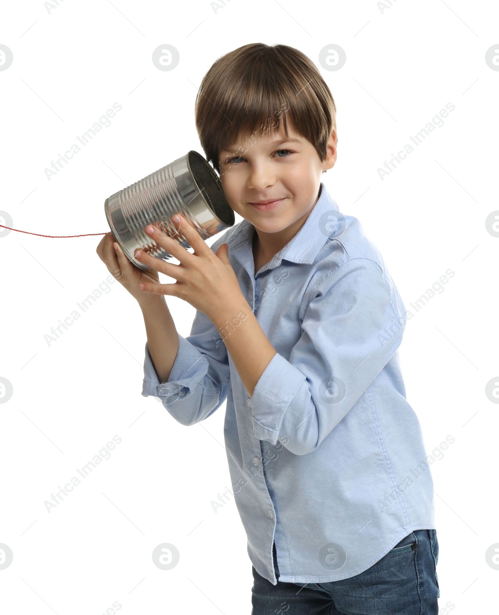 Photo of Boy using tin can telephone on white background