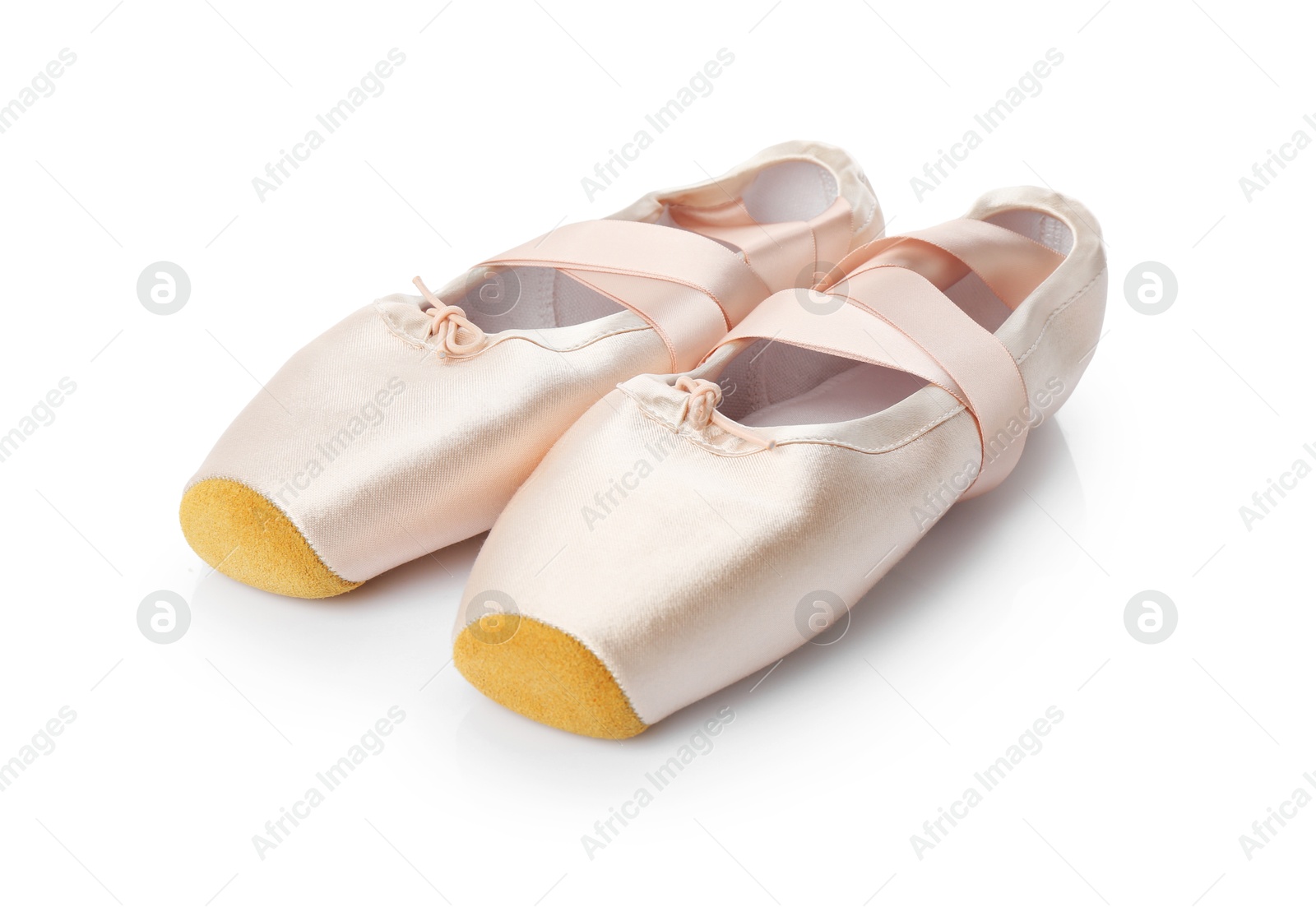 Photo of Pair of beautiful pointe shoes isolated on white