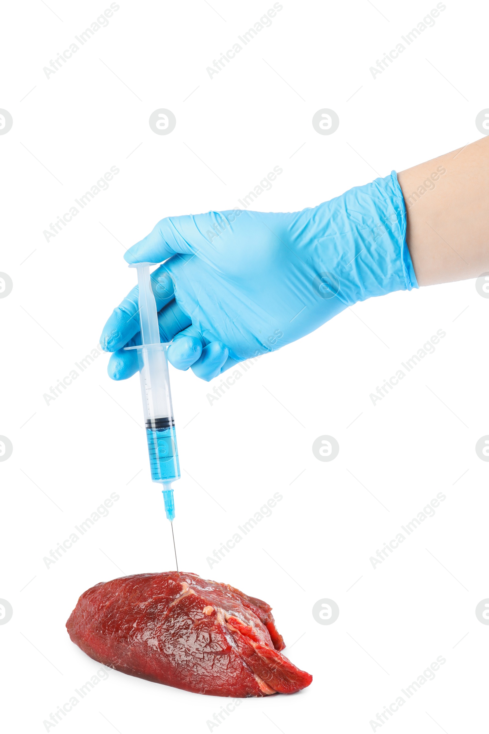 Photo of GMO concept. Scientist injecting something into piece of meat on white background, closeup