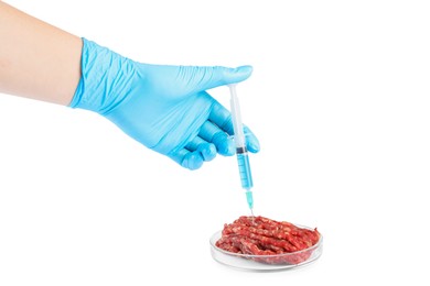 GMO concept. Scientist injecting something into minced meat on white background, closeup